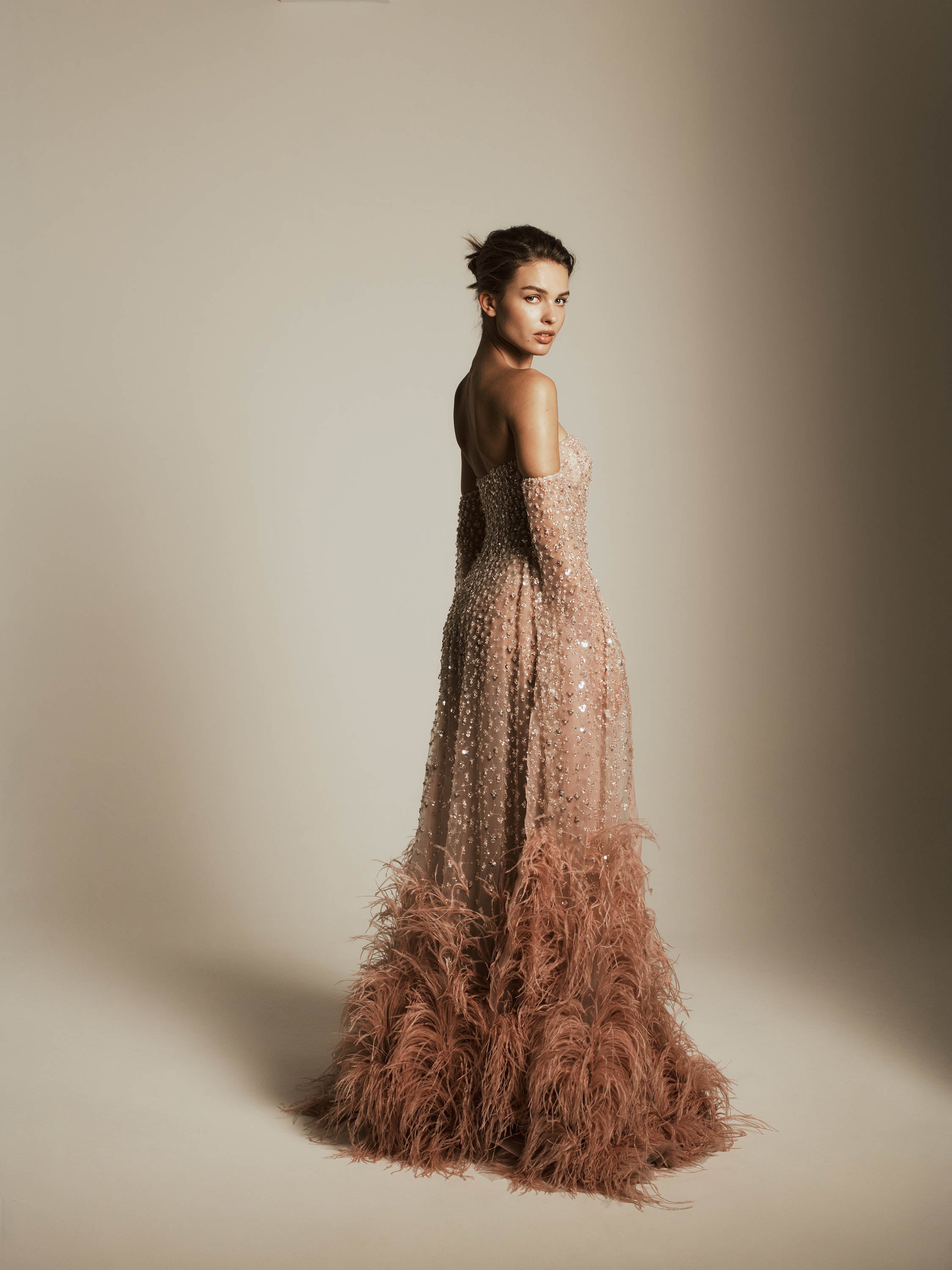 Beaded Gown with Feather Detail