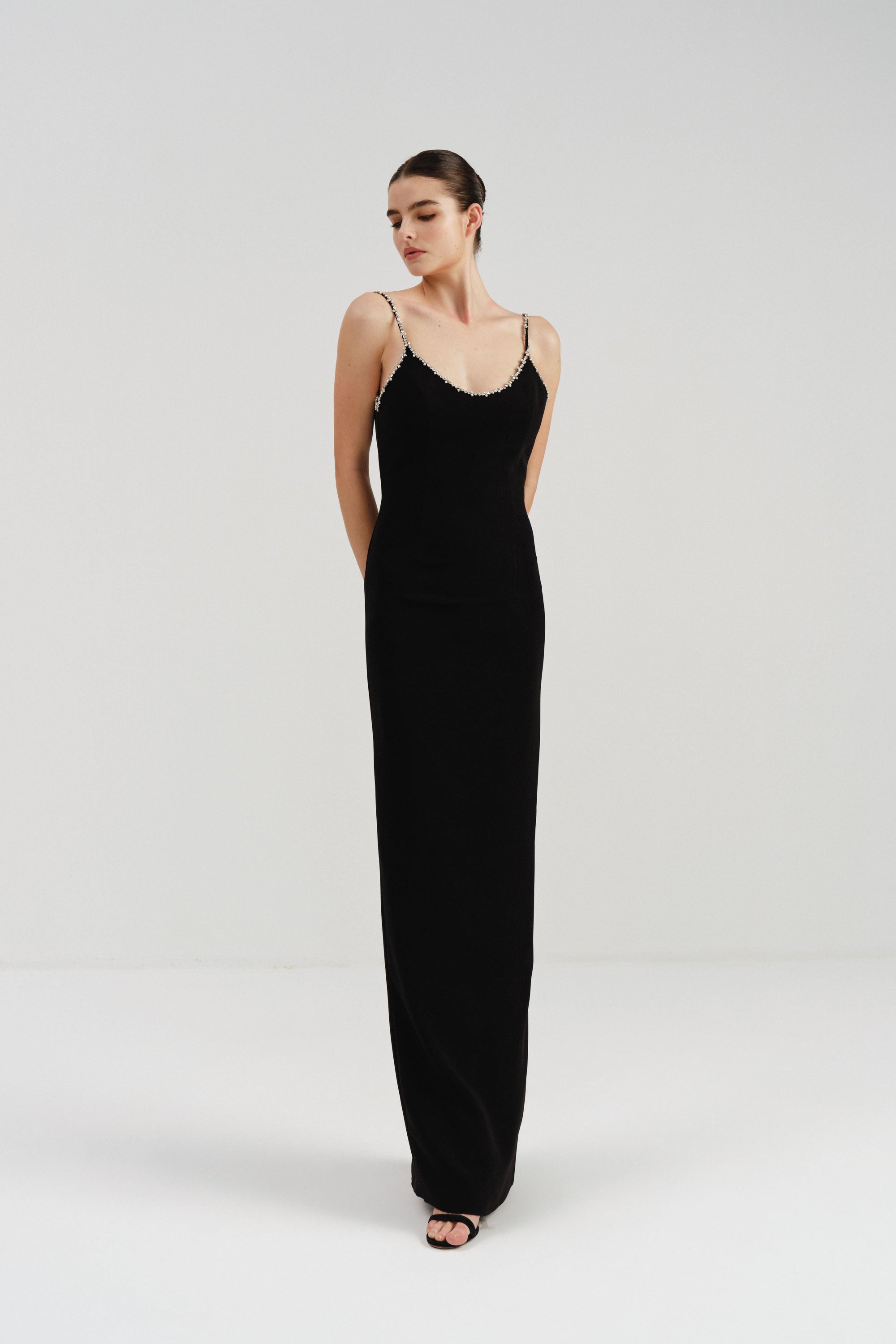 black dress with crystals Nox Anabel M1707 Size 10 Crystal Bow Corset Prom Formal Evening Gown Slit and the fabric composition is 100% polyester Long Sleeve Crystal Detail Midi